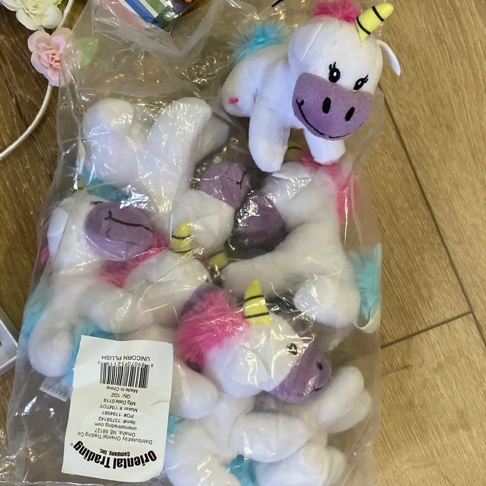Girls Unicorn party supplies headbands mood rings plush party favors cake topper